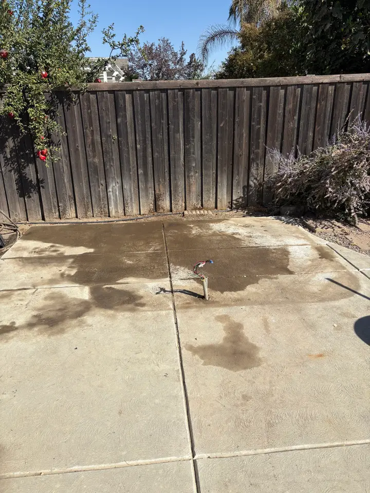 The same patio with the hot tub removed and the pad clear